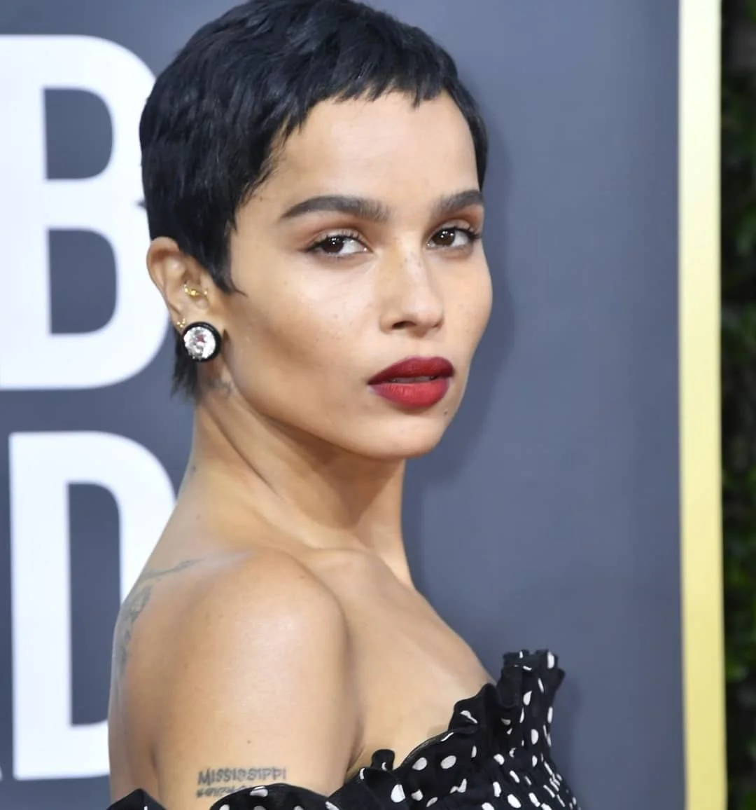 Very short pixie crop with micro fringe and soft black hair