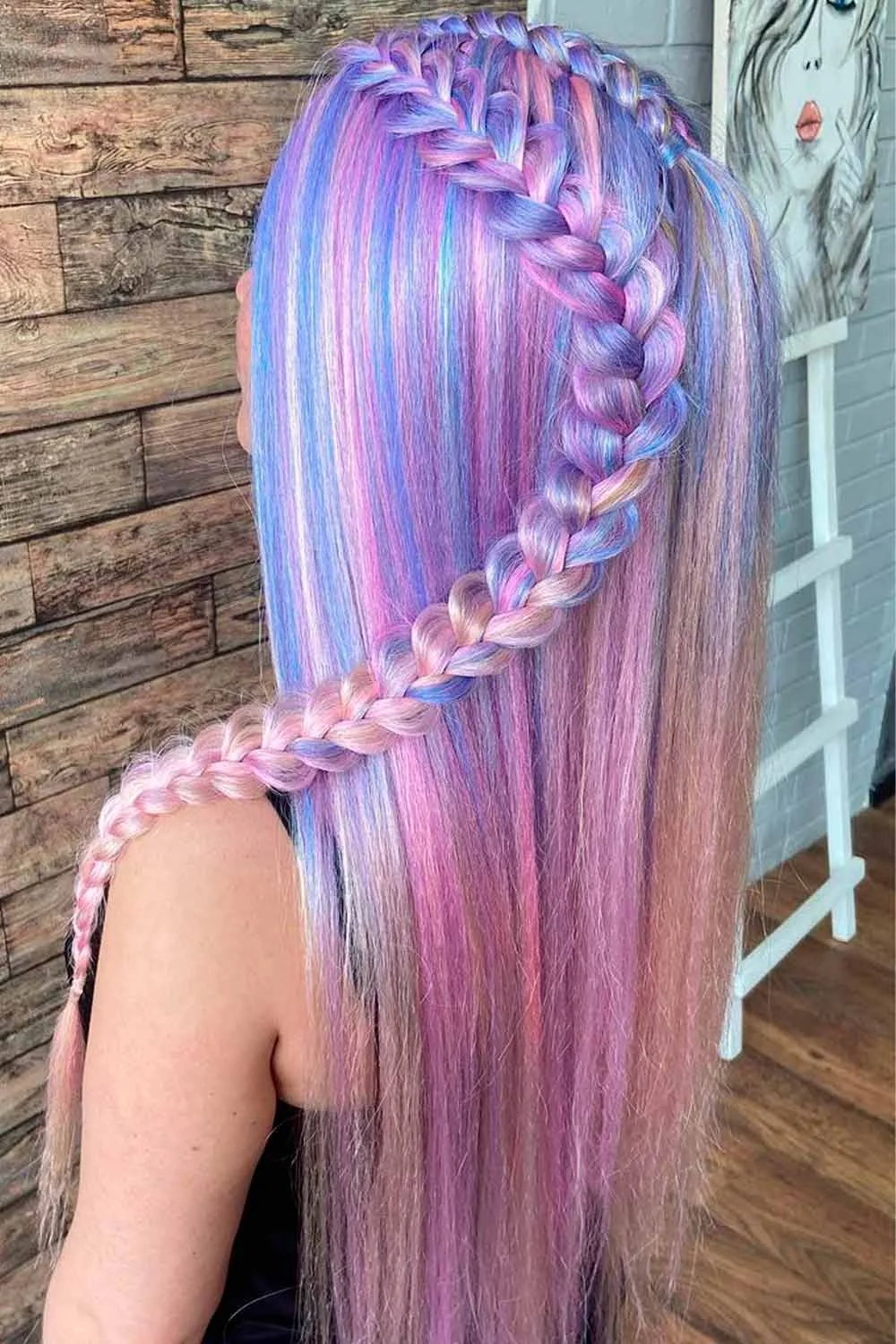 Back-side view of straight lilac, pink and blue hair with a curved braid along the side