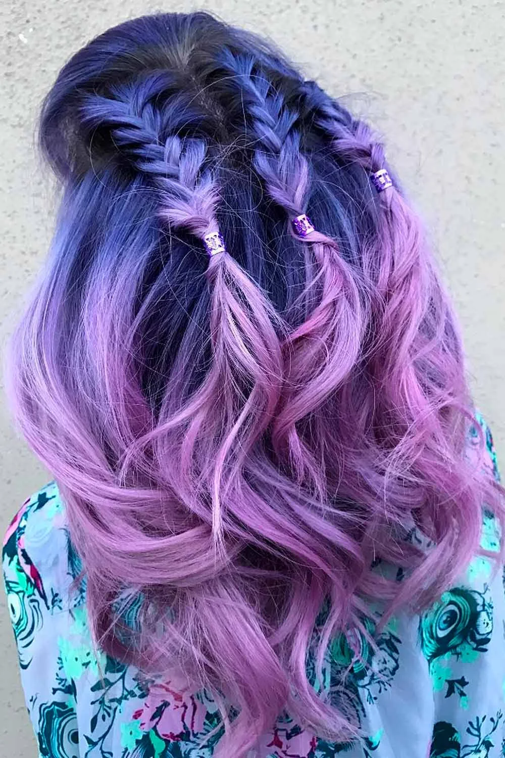 Back view of violet hair with three short crown braids and loose lilac waves