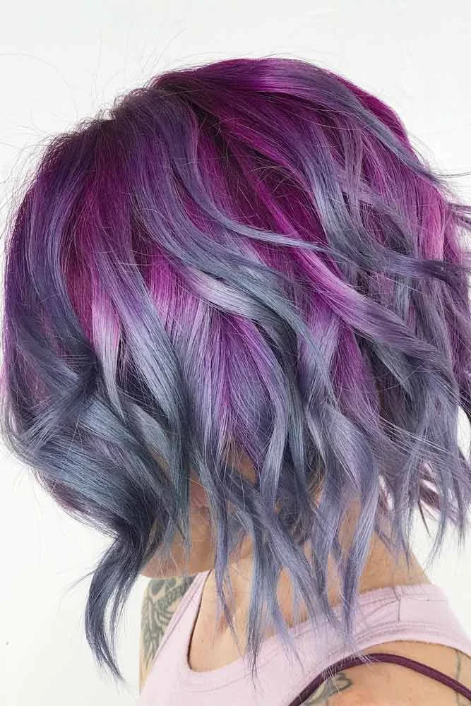 Side view of a choppy bob with purple roots blending into cool silver-gray ends