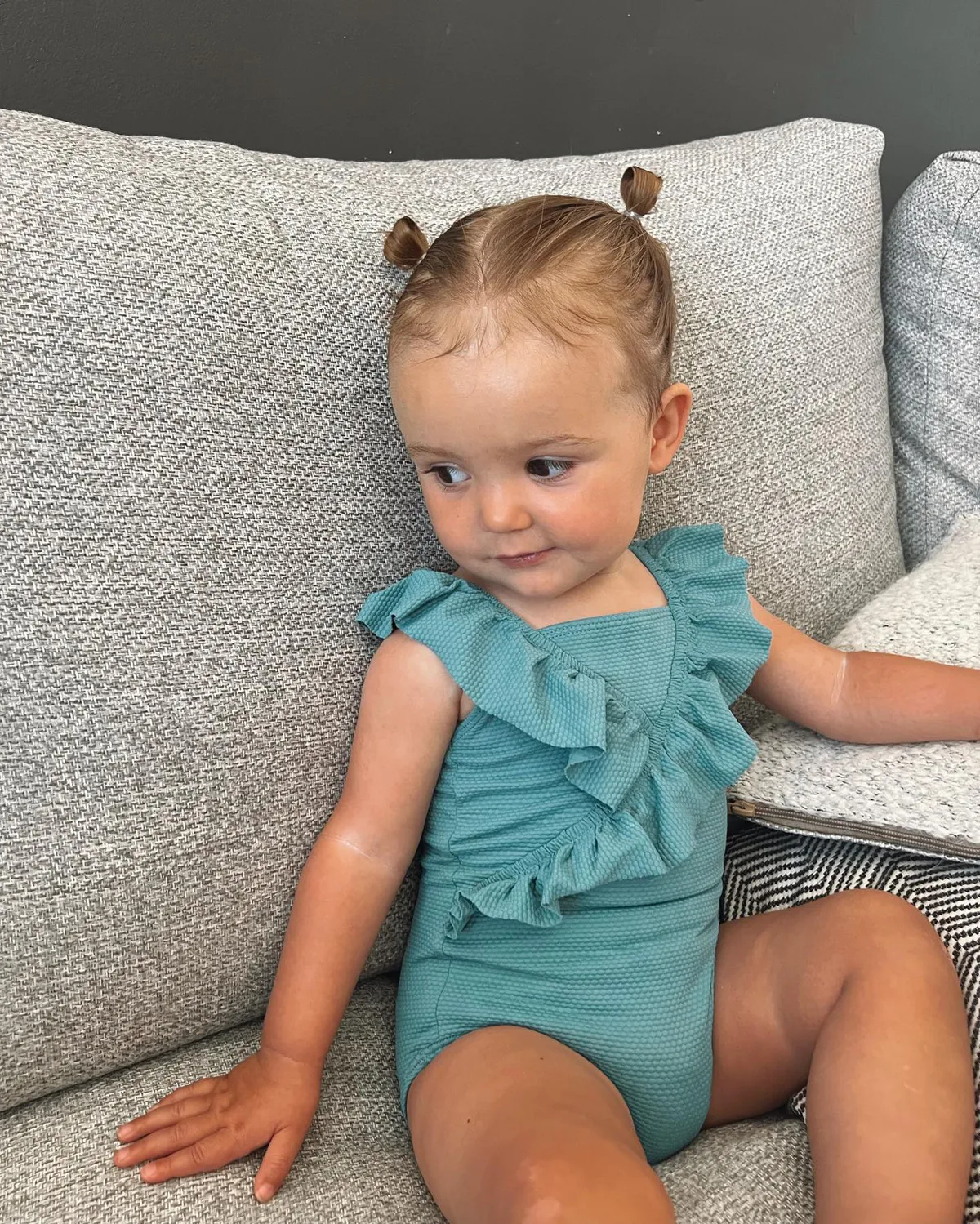 shoulder straight chestnut space buns shown as a school hairstyles idea