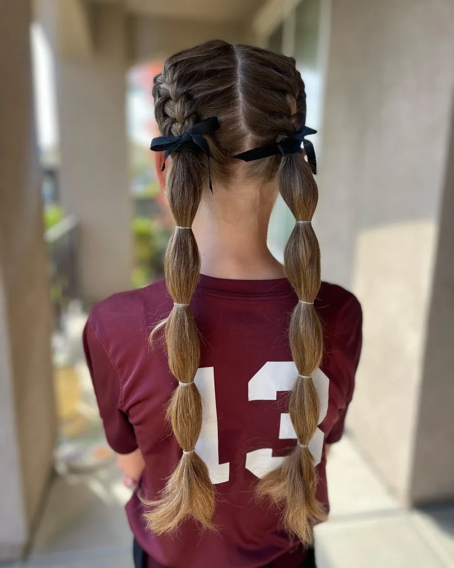 chest straight chestnut bubble pigtails shown as a school hairstyles idea