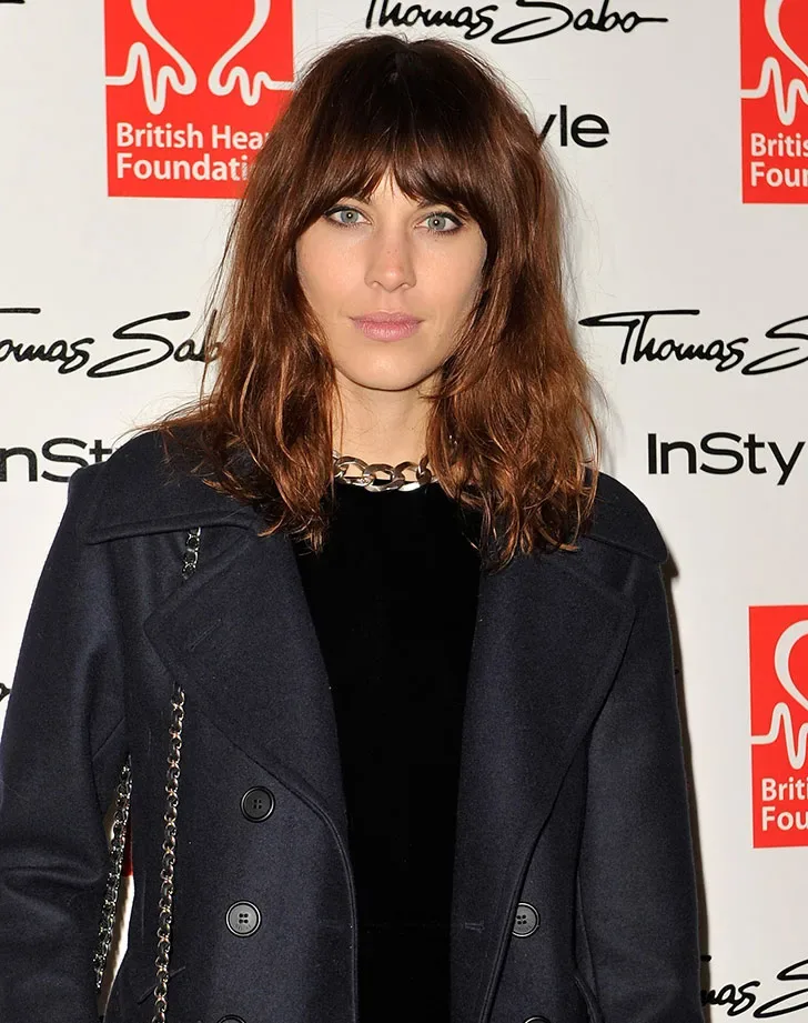 shoulder wavy chestnut shag with curtain fringe shown as a shag hairstyles for medium length thin fine hair idea, featuring heavy layering