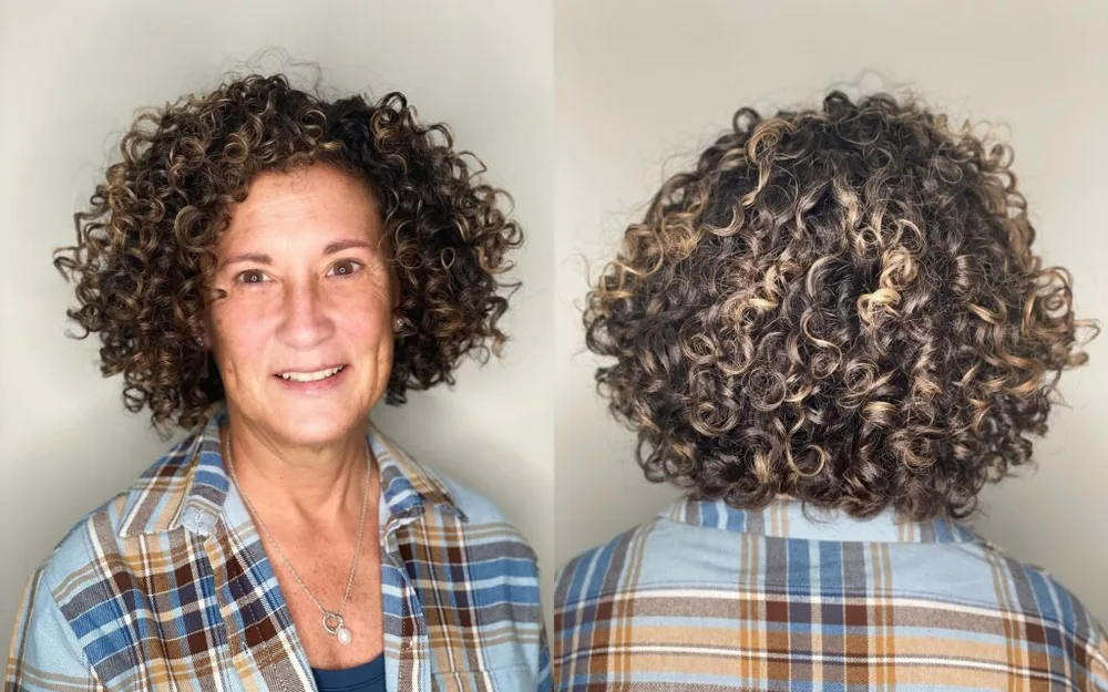 neck curly silver curly style shown as a shaggy bob for older women idea, featuring medium layering