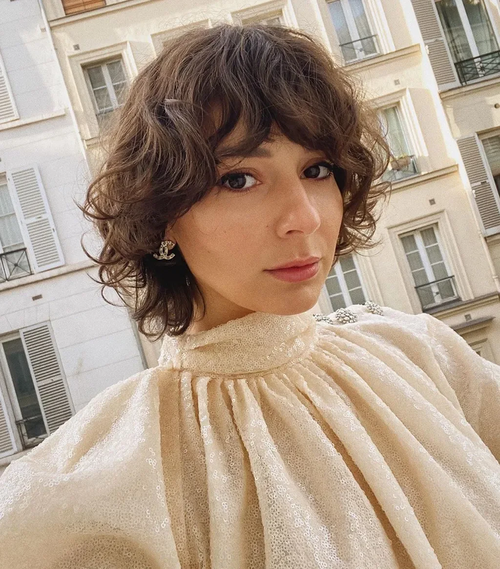shoulder wavy brunette shag with curly fringe fringe shown as a shaggy lob idea