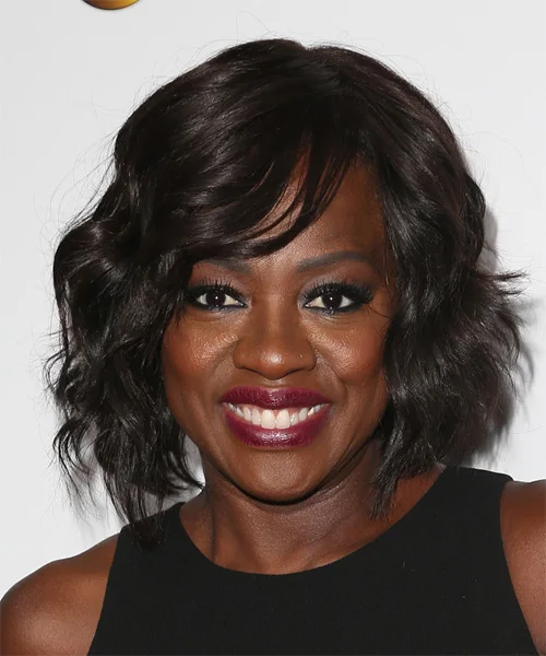Layered brunette short bob with soft movement and side bangs