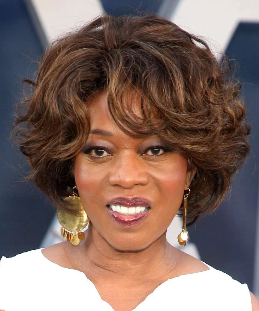 Short curly bob with bangs and rounded volume