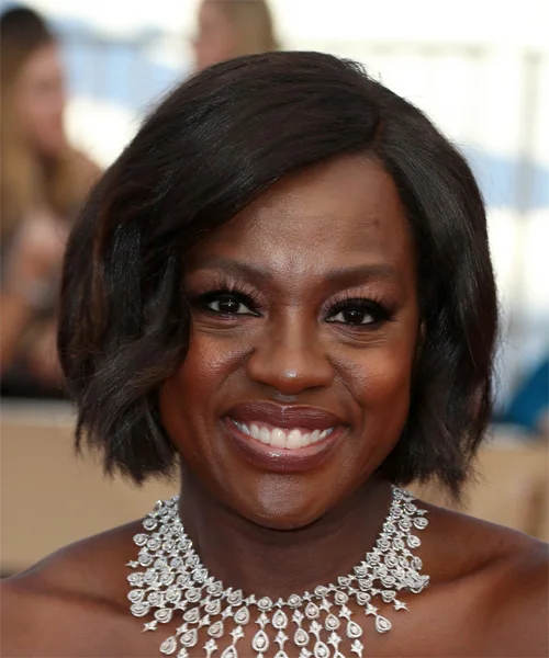 Pink chin-length short bob with a soft rounded edge