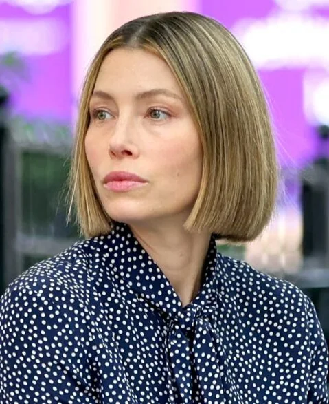 Blonde sleek chin-length bob with a clean fine-hair edge