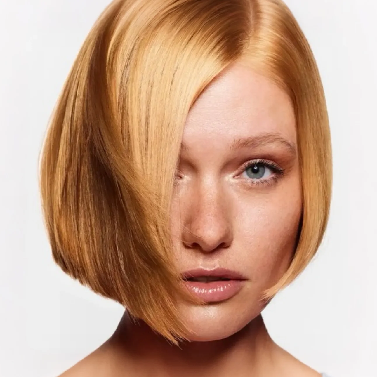 Copper chin-length bob with a clean side line