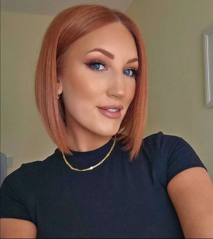 Copper angled bob with a longer front and sleek side shape