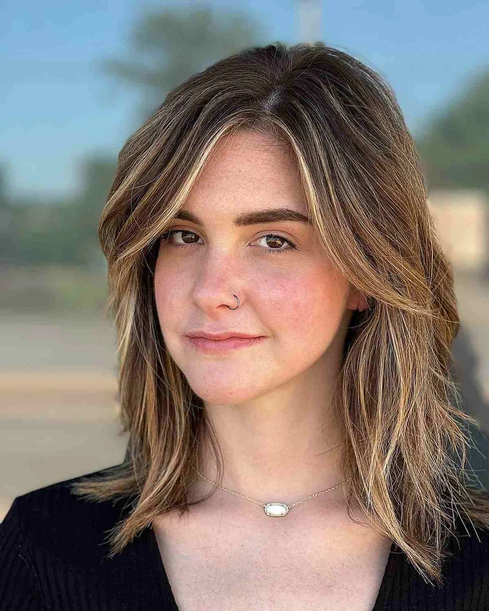 shoulder wavy chestnut shag with curtain fringe shown as a short butterfly haircuts idea