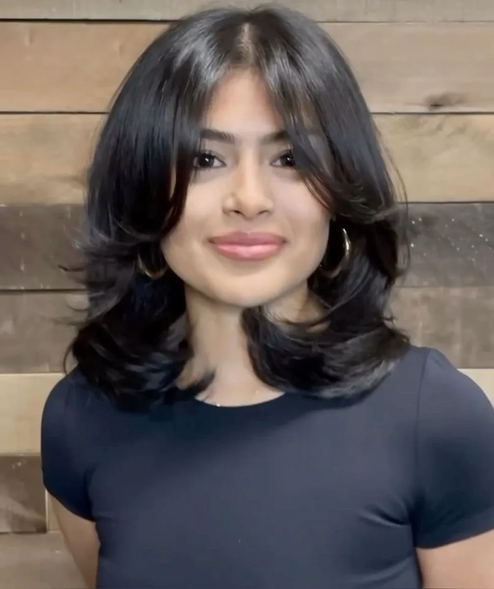 medium straight black layers shown as a short butterfly haircuts idea