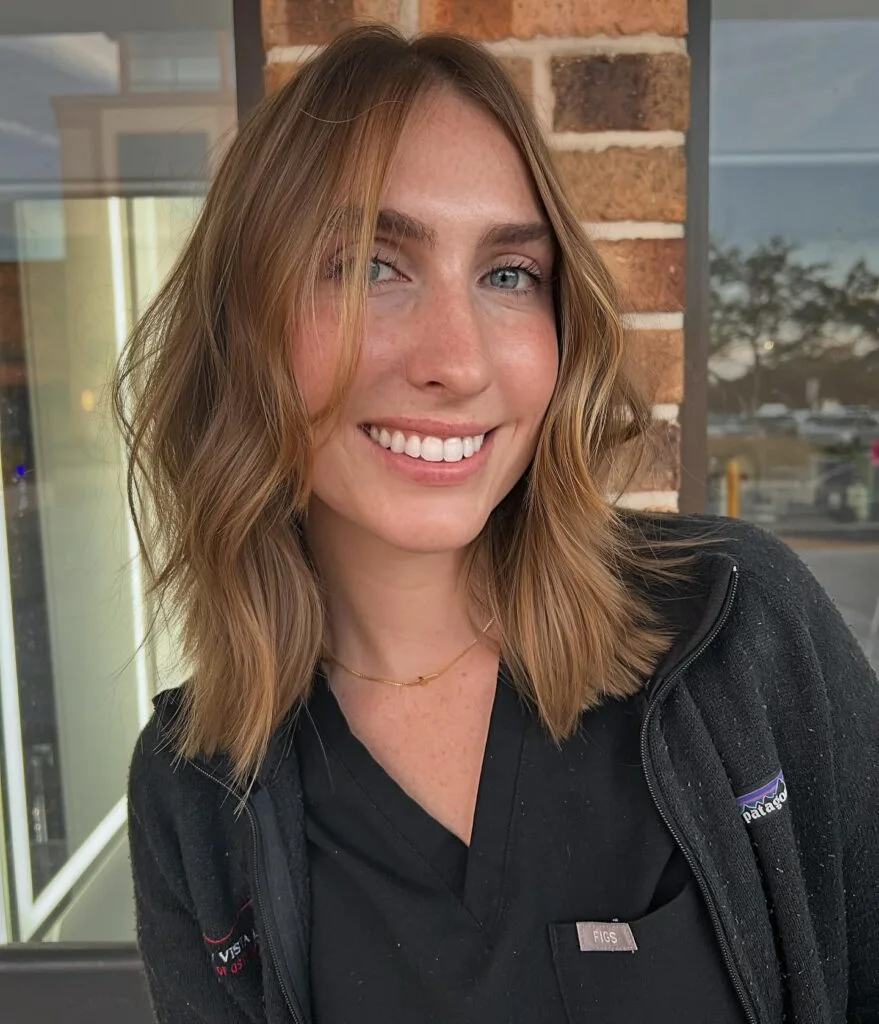 shoulder wavy chestnut lob shown as a short butterfly haircuts idea
