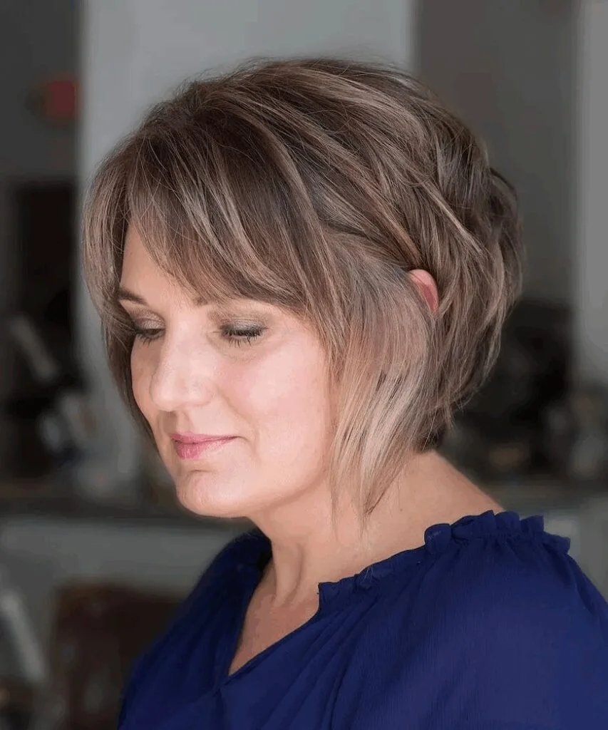 Taupe short layered bob with soft bangs for fine hair