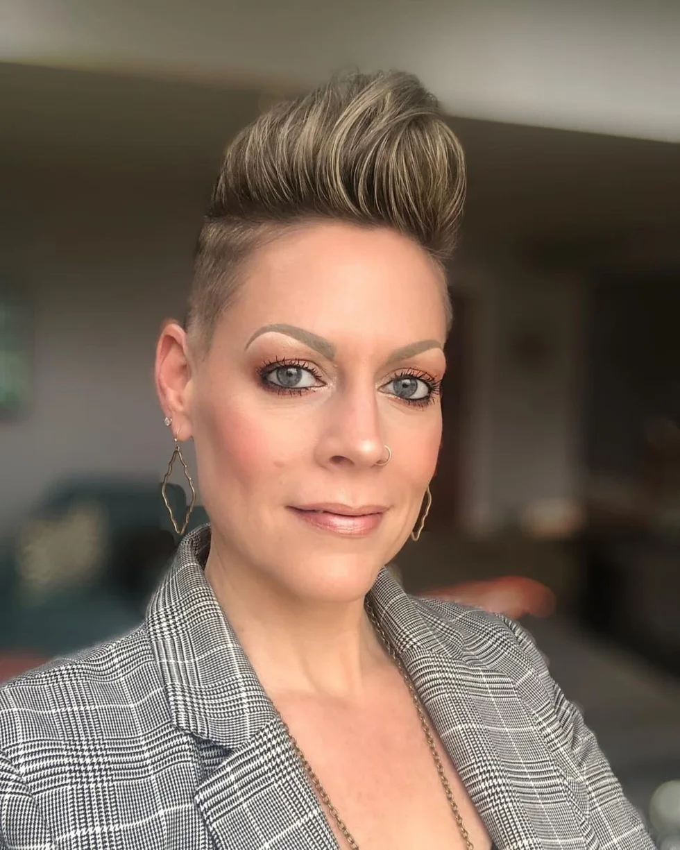 Lifted blonde pompadour pixie with crown height for fine hair