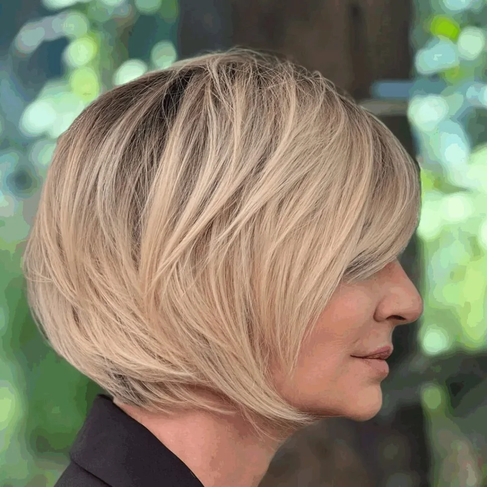 Layered blonde bob with side volume for short fine hair