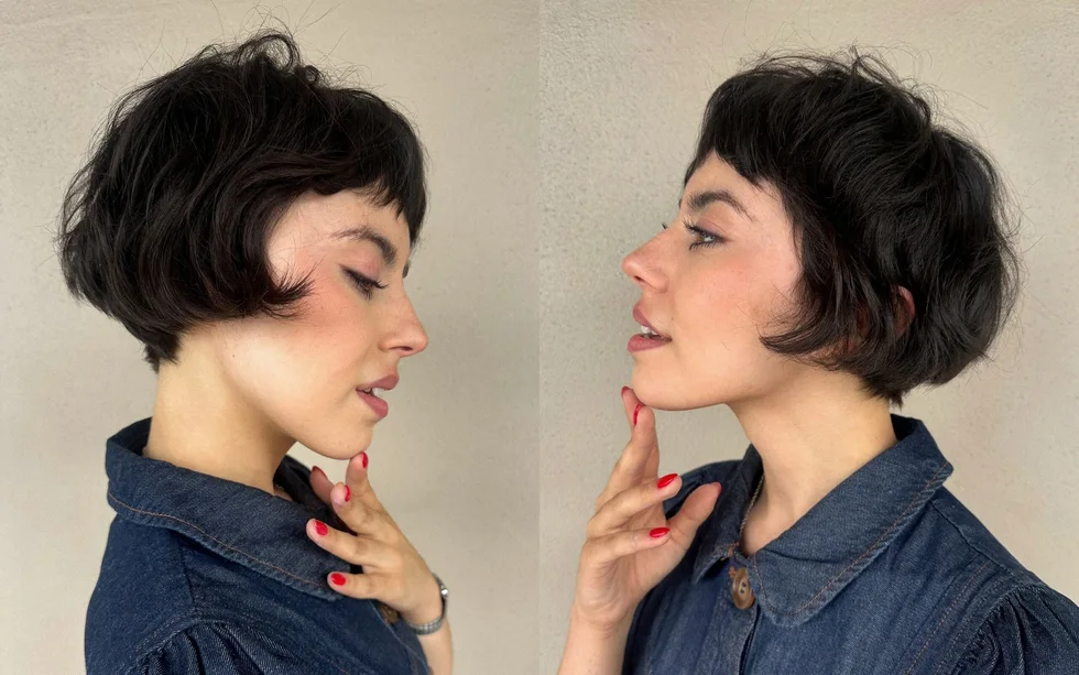 Black pixie bob with short bangs and rounded side shape