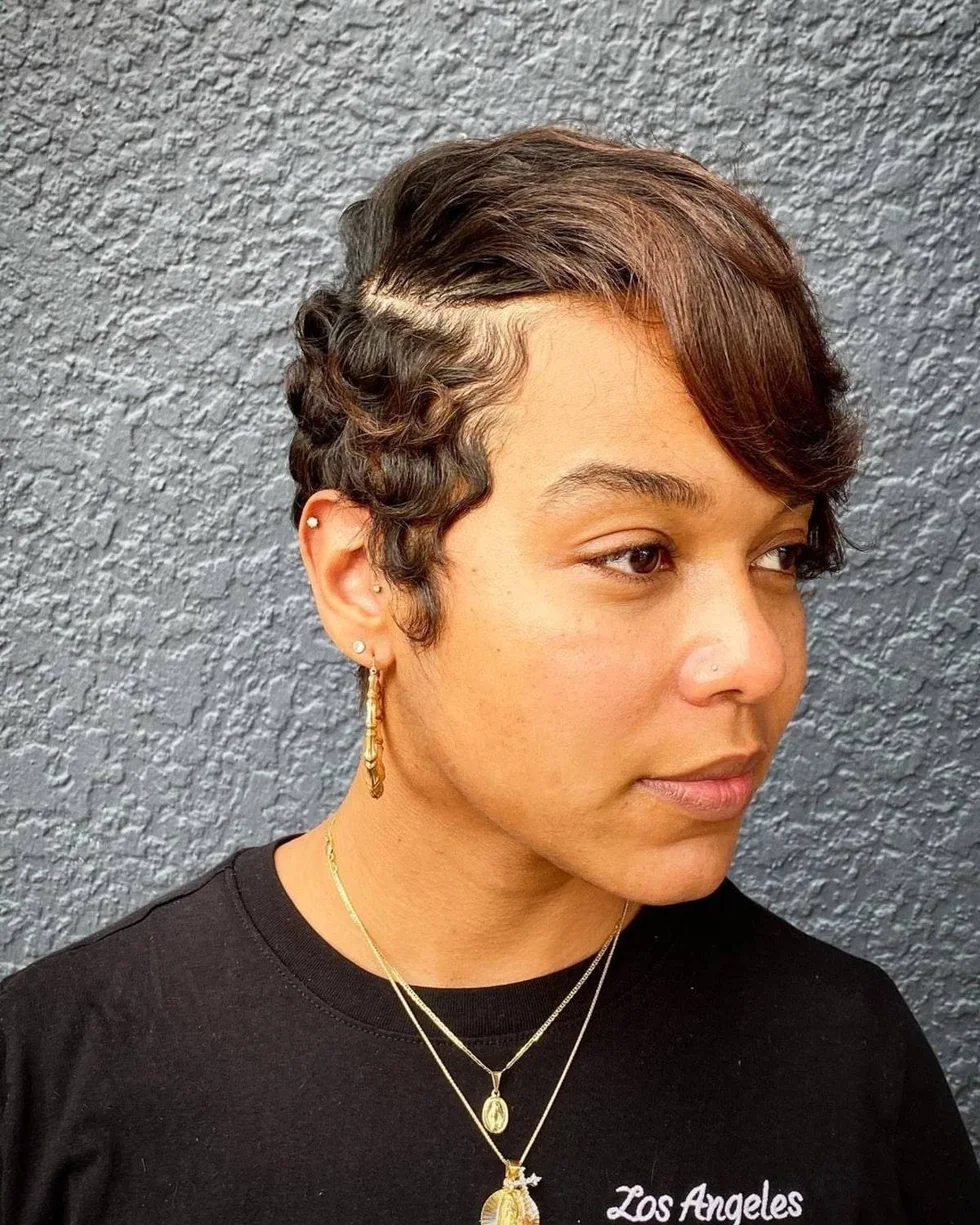 Short sculpted finger-wave pixie with glossy side detail