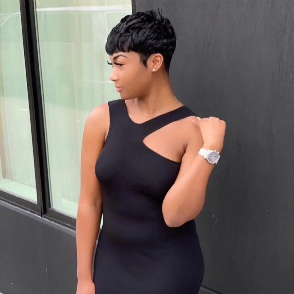 Sleek black pixie haircut with clean tapered sides