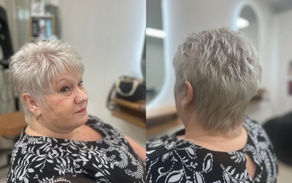 ear straight ash pixie with side swept fringe shown as a short haircuts for women over 60 idea