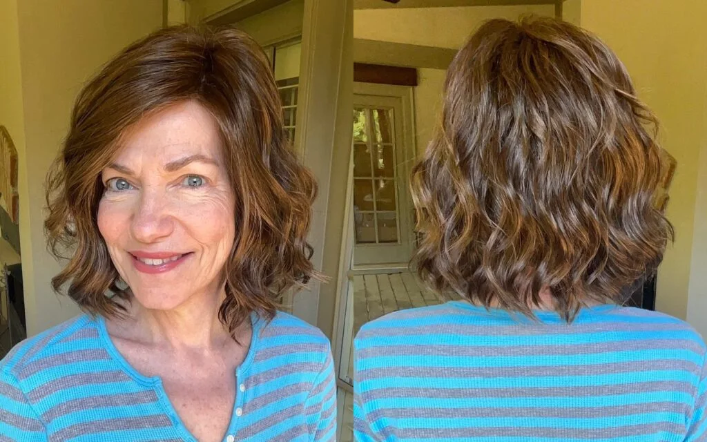 Soft brunette pixie shag haircut for an older woman with relaxed texture