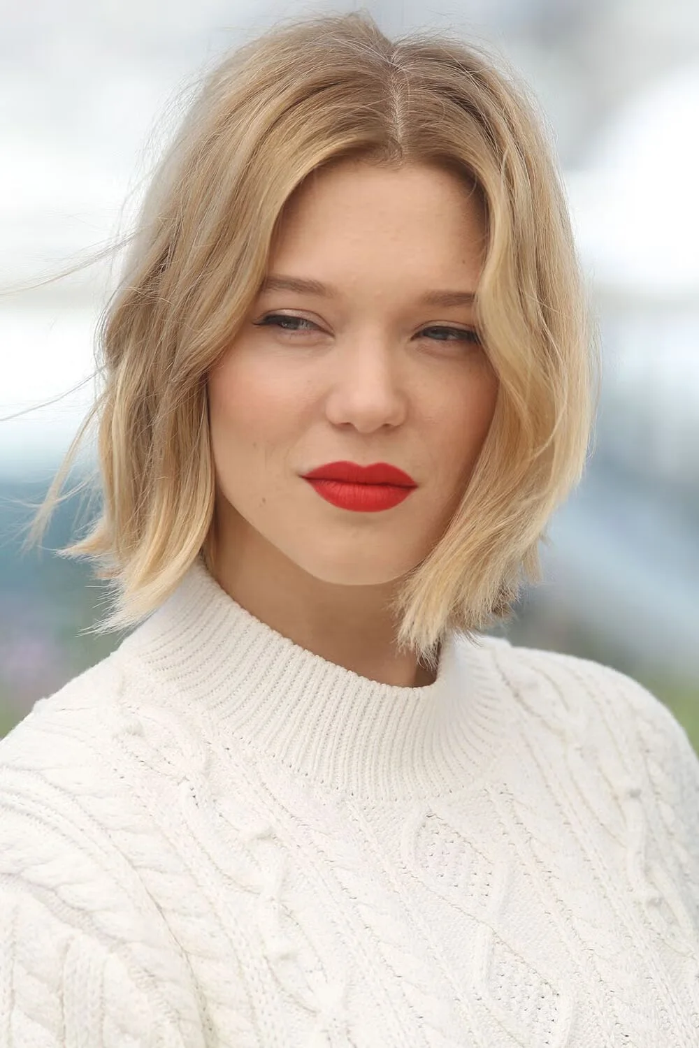 Soft blonde blunt shoulder length lob for thin fine hair with a clean lower edge