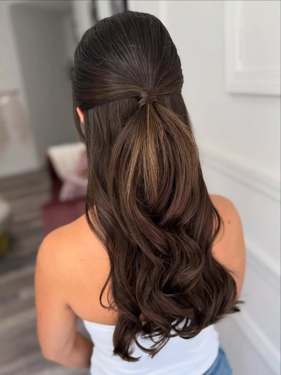 Back view of simple clipped waves for wedding guest hair