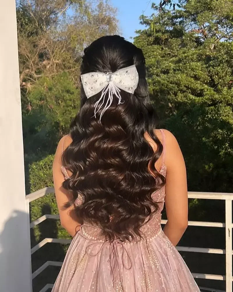 chin wavy chestnut bob shown as a simple wedding guest hair idea