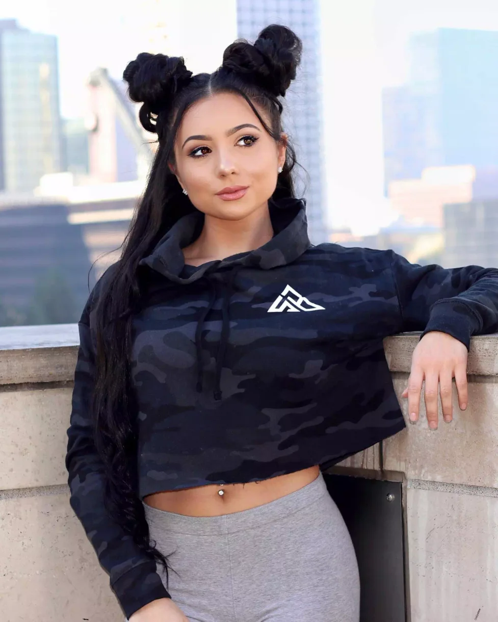 High black space buns with long hair styled into two rounded knots