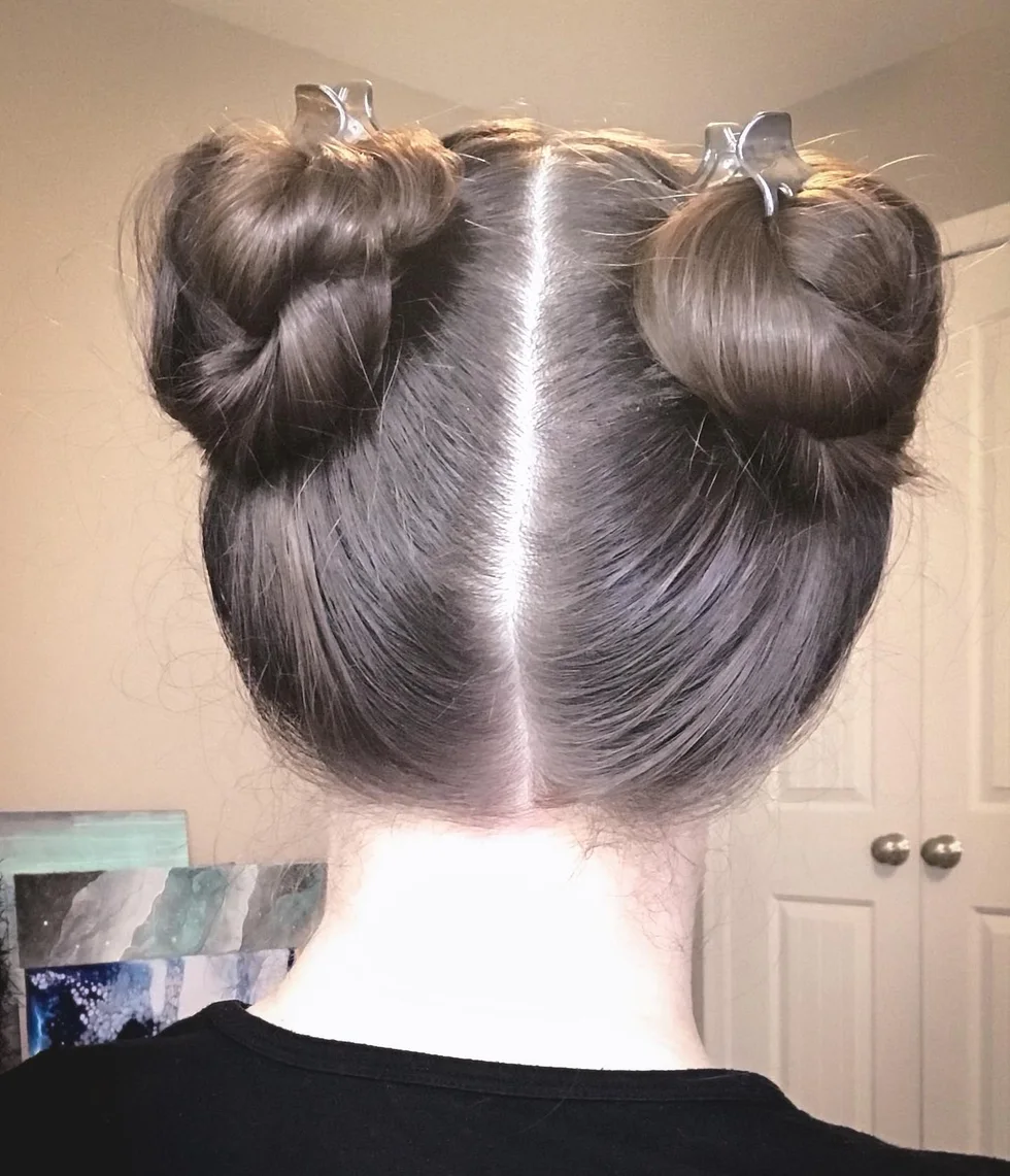 shoulder straight chestnut space buns shown as a space buns idea, featuring volume through the low volume