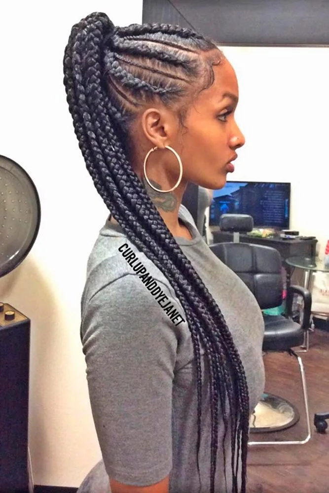 Side view of scalp braids gathered high into a ponytail of long braids