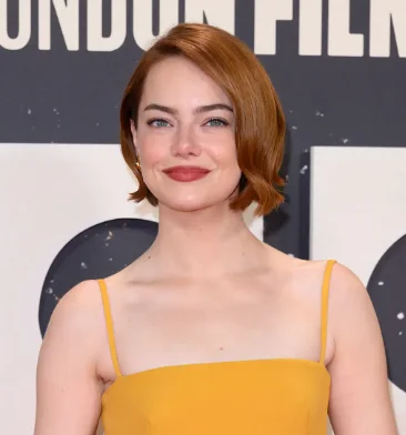 chin wavy golden bob shown as a thin hair bob idea, featuring volume through the low volume