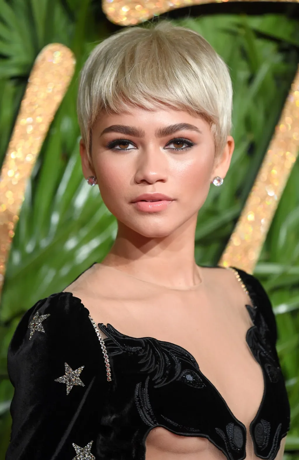 ear straight ash pixie with micro fringe shown as a thin hair hairstyles short idea