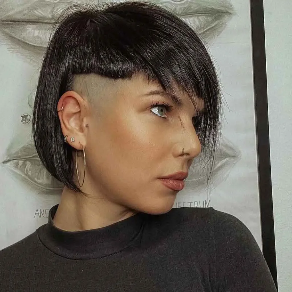 ear straight golden mullet with micro fringe shown as a thin hairstyles with bangs idea