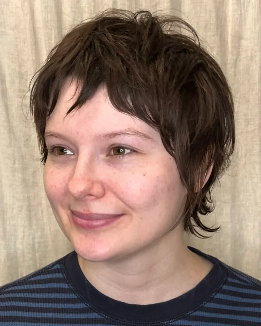 ear straight golden pixie with wispy fringe shown as a thin hairstyles with bangs idea, featuring golden color, shown in soft pixie with baby bangs