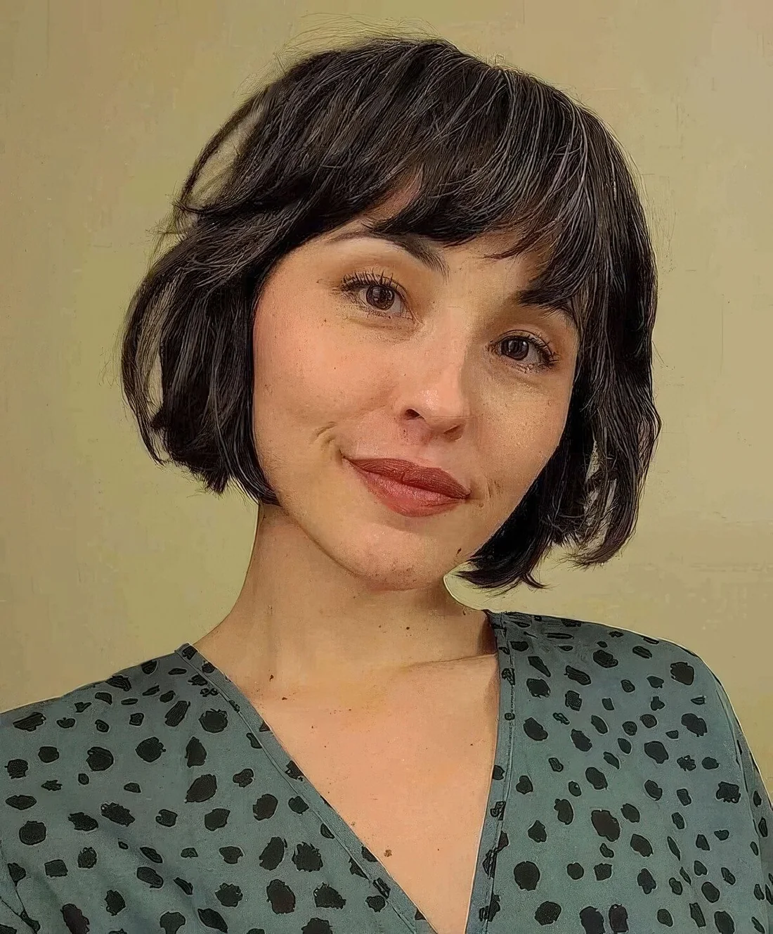 Photo showing black bob bangs, with the hairstyle clearly visible.