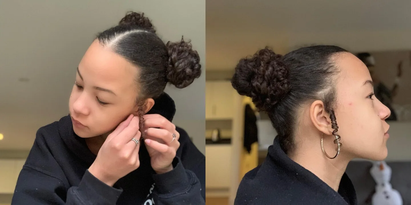 side braided bun with black straight hair styled as an updo for fine thin hair