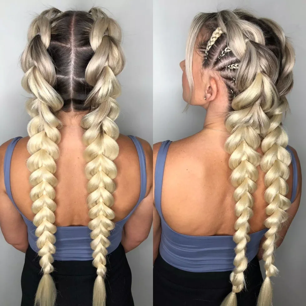 Back view of double Dutch blonde Viking braids with thick raised sections