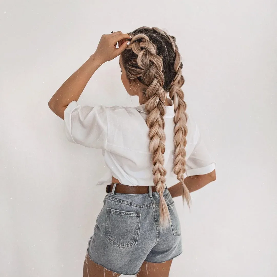 chest braids honey dutch shown as a viking braids hairstyles for women idea, featuring chest outline, shown in long blonde pull through braid back view for viking braids hairstyles for women