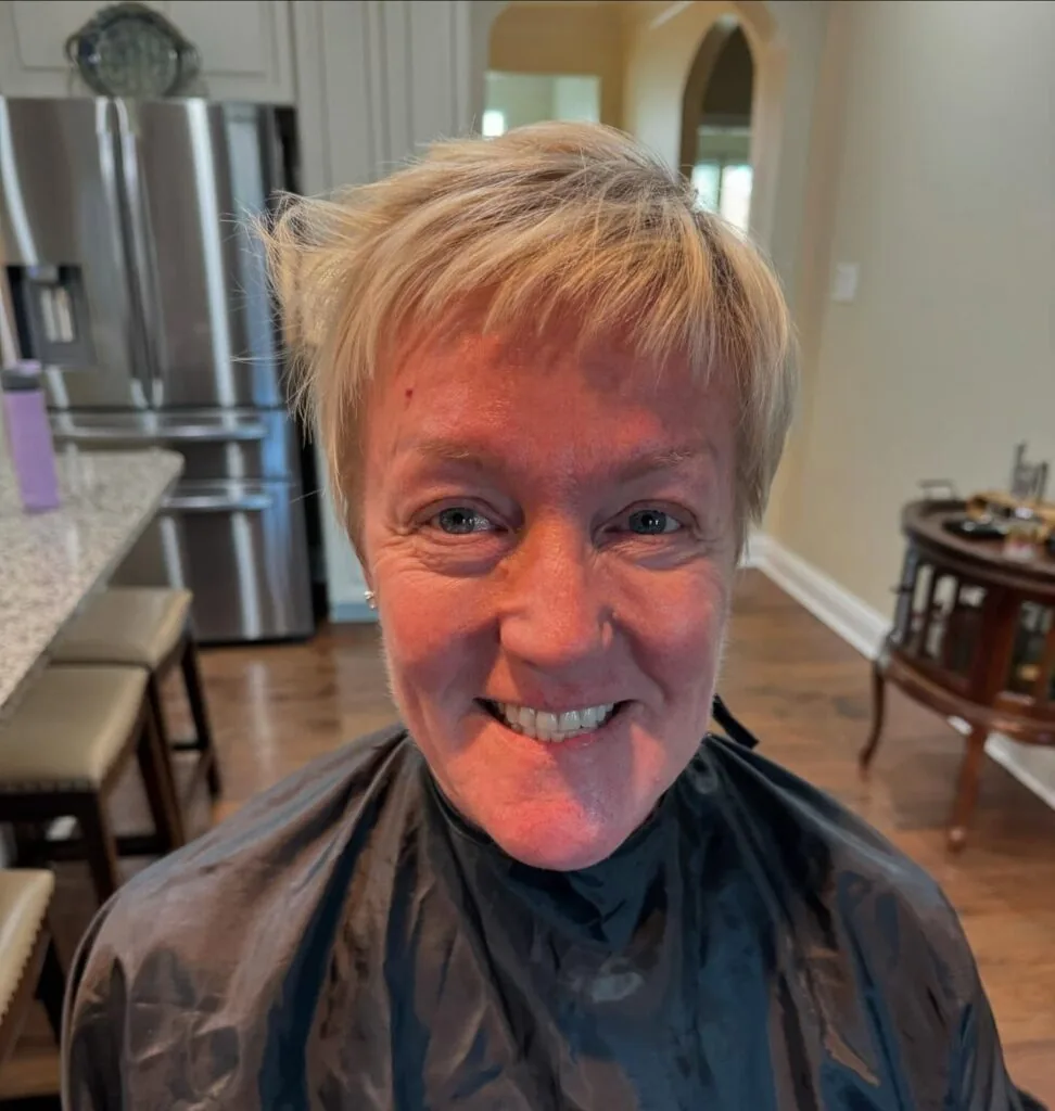 ear straight blonde pixie with wispy fringe shown as a wash and wear hairstyles women over 70 thin fine hair idea