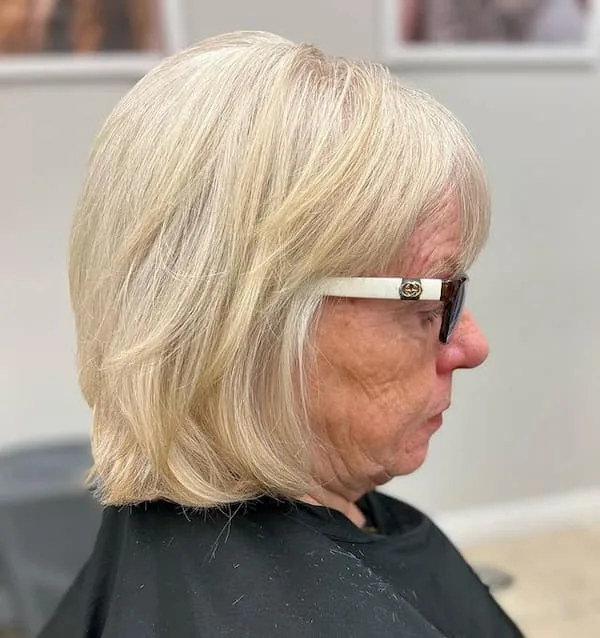 neck straight silver bob shown as a wash and wear hairstyles women over 70 thin fine hair idea, featuring neck outline