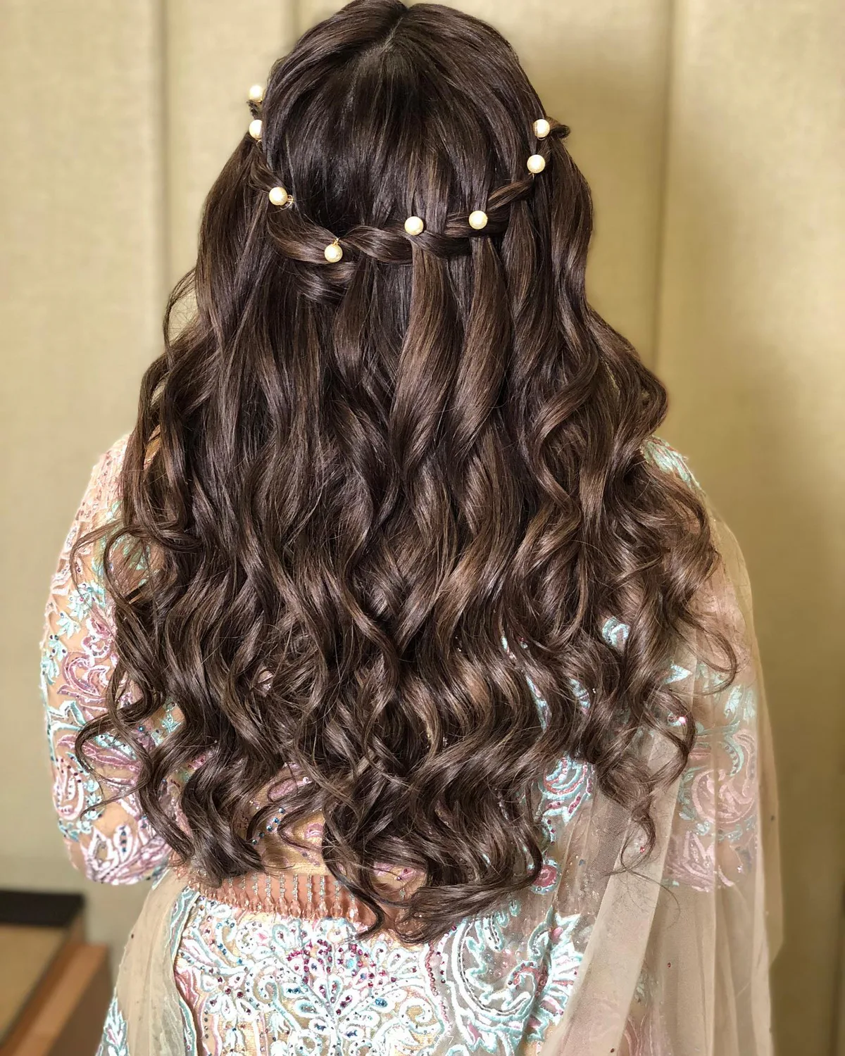 chest braids brunette braid shown as a waterfall hairstyles idea, featuring glossy finish