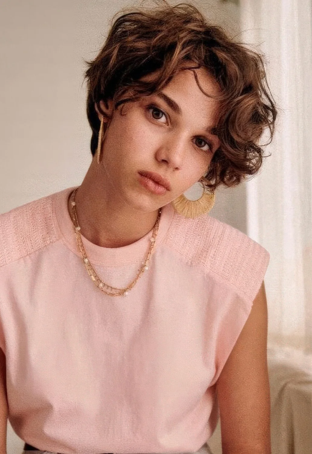 Bixie haircut styles with waves and curls.