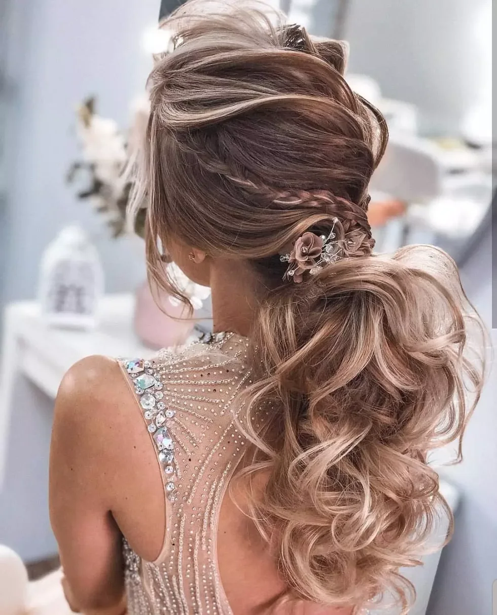 chest straight black ponytail shown as a wedding guest hairstyle idea, featuring chest outline