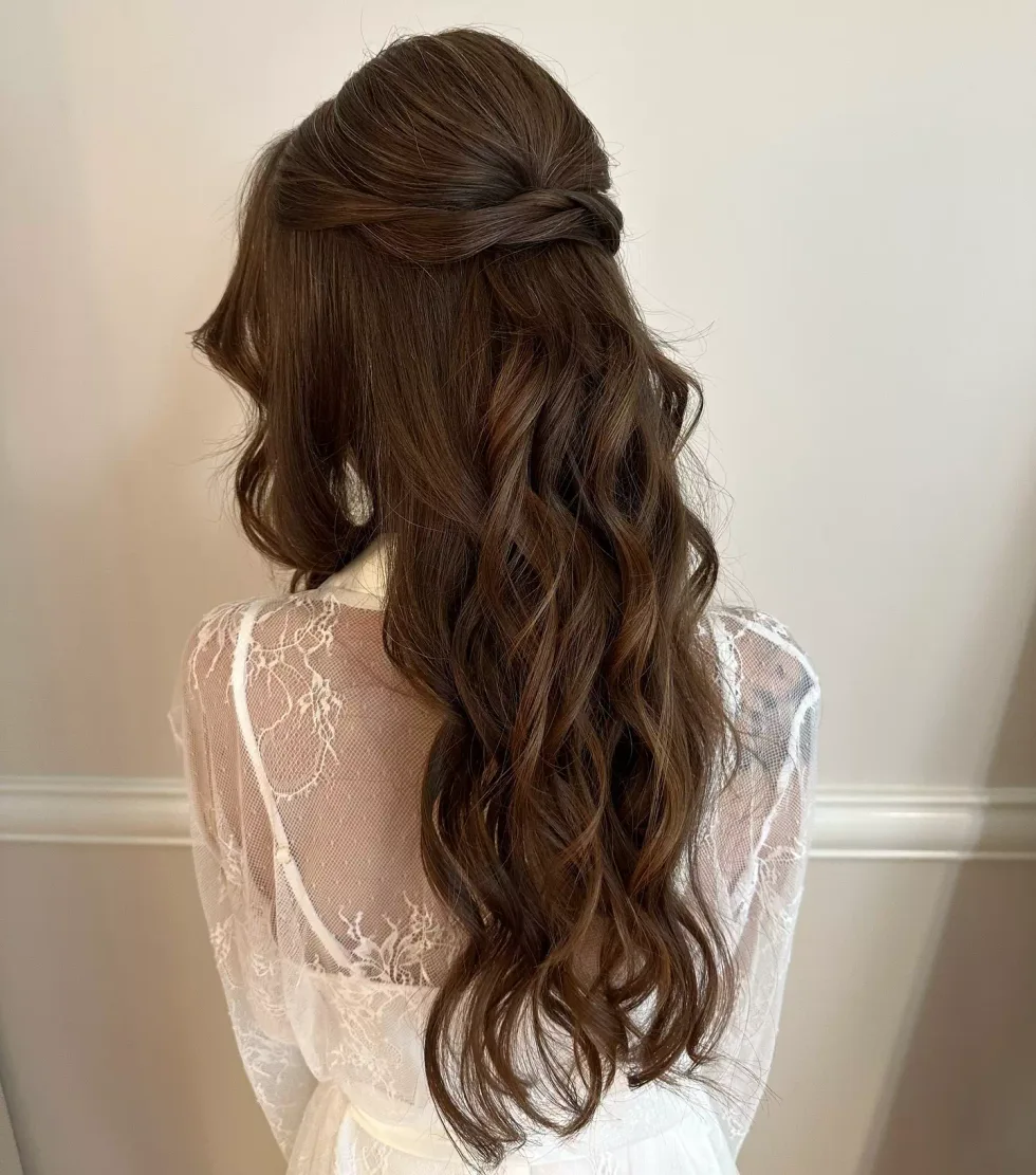 chest wavy black layers shown as a wedding hairstyles ideas for long hair idea